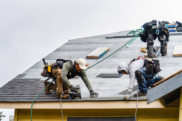 Professional Gutter Installation technician working in Clark, NJ